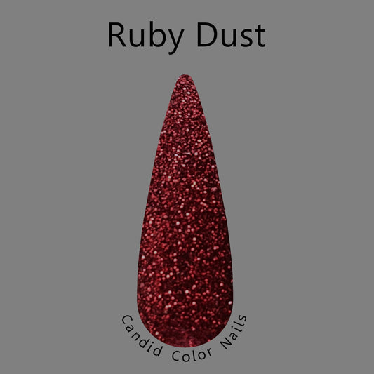 A finger nail swatch with a dark red extra fine metallic / reflective glitter in a clear dip powder base.