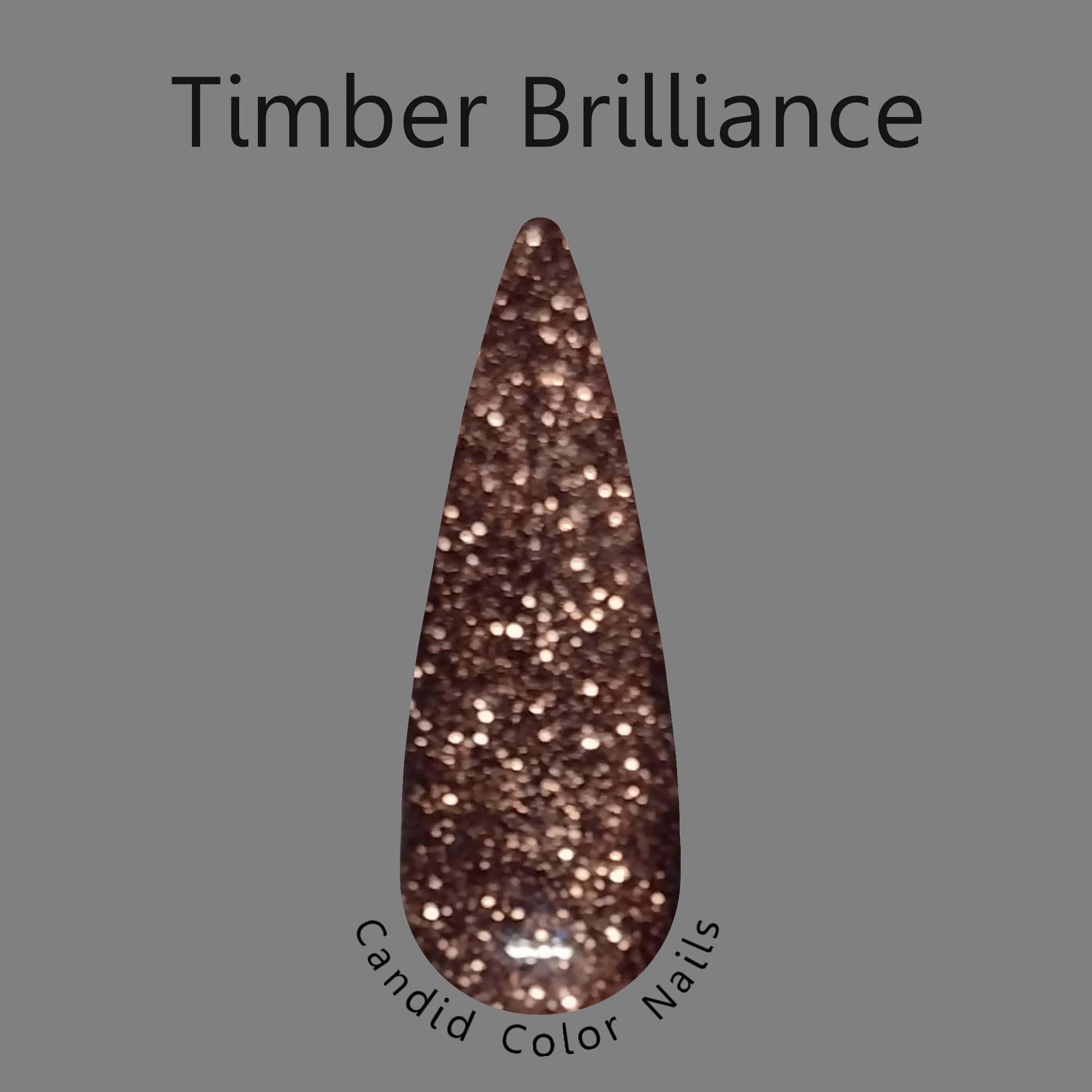 A finger nail swatch with a medium brown extra fine metallic / reflective glitter in a clear dip powder base.