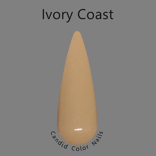 A finger nail swatch with a light tan opaque dip powder with a very slight shimmer most likely only seen in the sun.